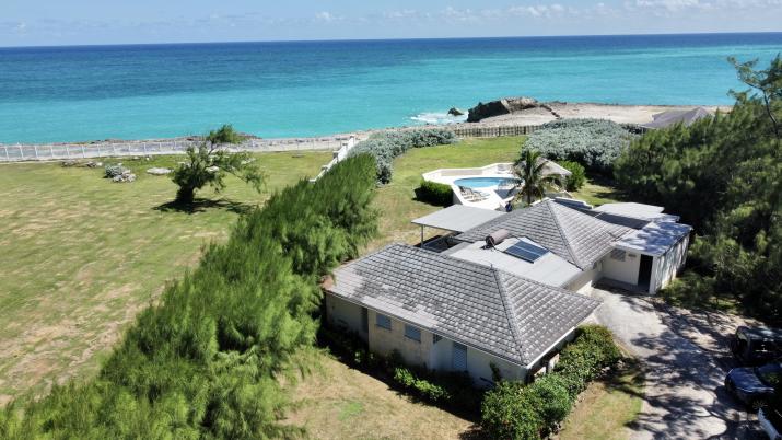Paradise Point Oceanfront Home For Sale In Barbados Aerial View of Ocean Over Roof