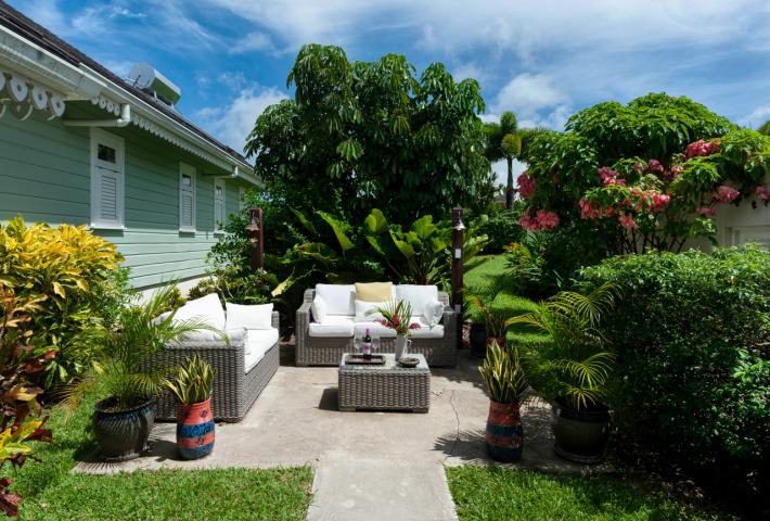 Villa Irene 4 Bedroom Home For Sale In Barbados Seating In Garden Court Yard