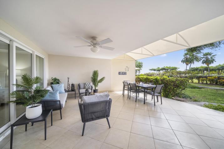 For Sale Condominiums at Palm Beach Unit 104 Barbados Cover Patio with Seating