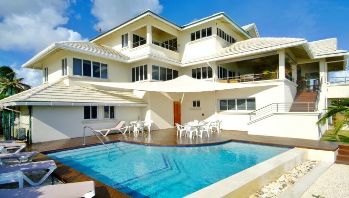 Petros Villa Barbados For Sale View From Ocean Looking Over Pool to House