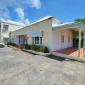 Brigade House Hastings Barbados For Sale Main Building and Parking Lot 