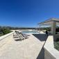 Paradise Point Oceanfront Home For Sale In Barbados Pool with Sun Loungers