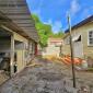 For Sale Home In Charnocks Barbados Backyard and Garage