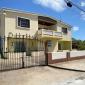 Ocean Manor and Apartments Silver Sands Barbados For Sale Main House Front Façade With Gate