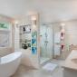 Villa Irene 4 Bedroom Home For Sale In Barbados Master Bathroom with Tub and Glass Enclosed Shower